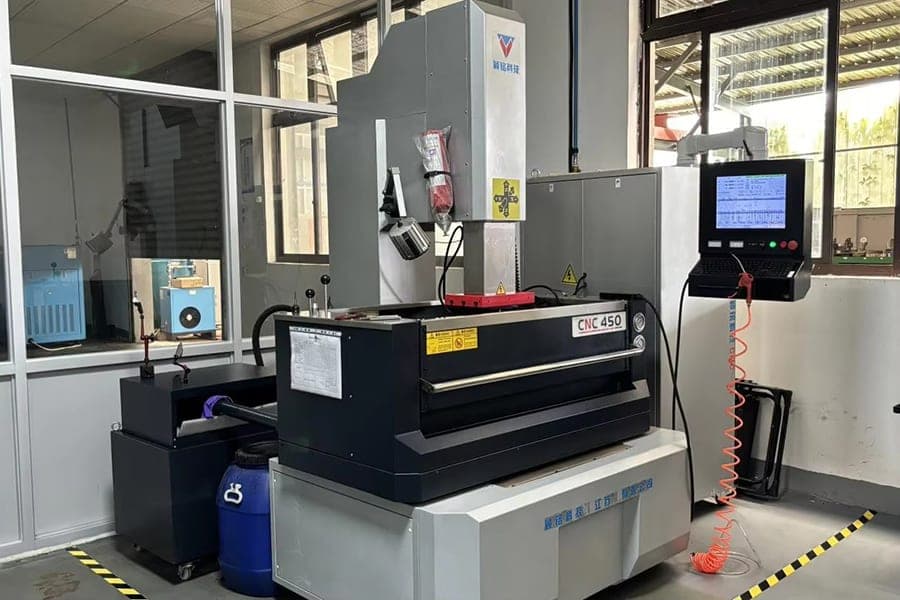 Electrical-discharge machine in a factory work area