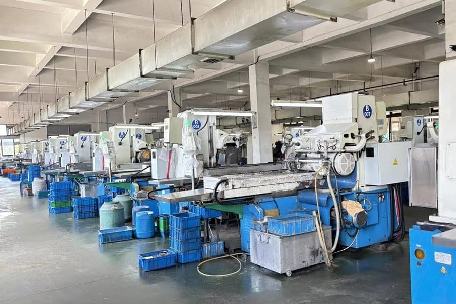 Rows of grinding equipment inside the factory