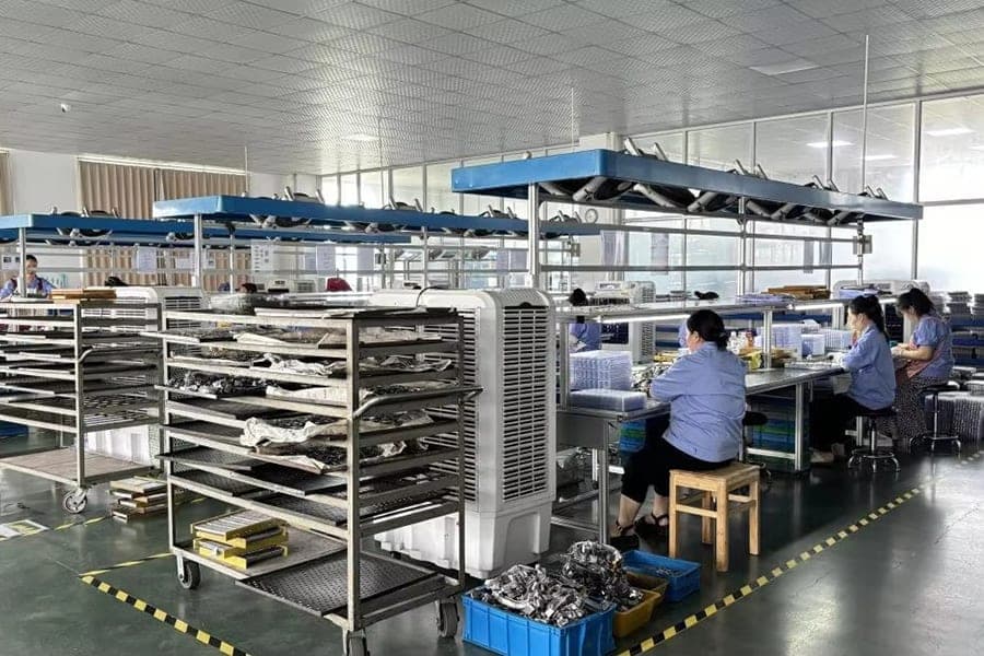 Personnel working at inspection and packing stations